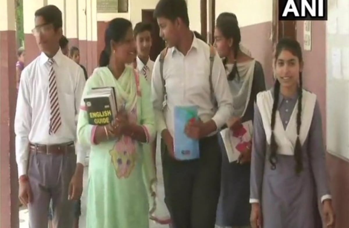 44 year old Rajni Bala is giving Class X examination with his Son 