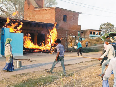 Fire brigade, farm and cattle burn