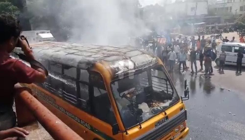 agra protesters set fire on school bus
