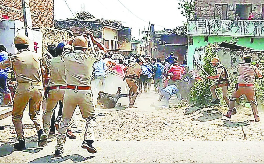 Protesters attacked police, broke vehicles