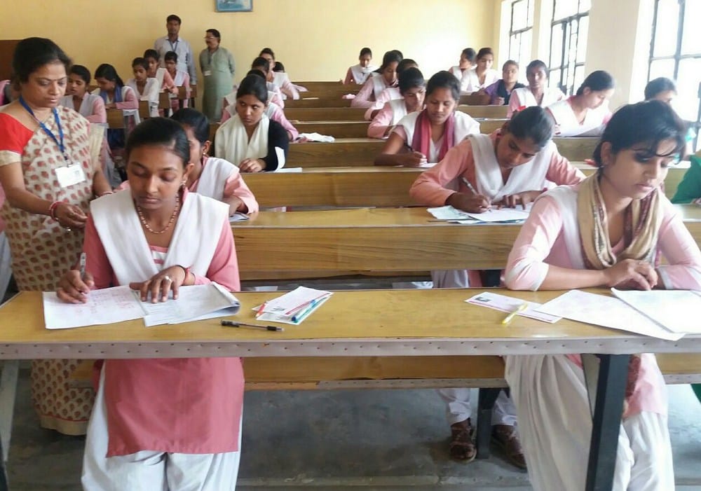 a girl student caught cpying