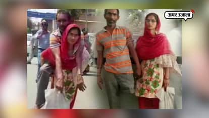 Woman carries handicapped husband on her back to get disability certificate in Mathura 