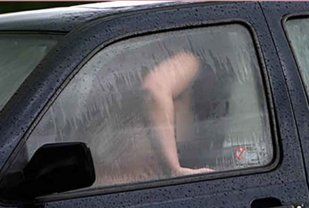 drunk couple was getting intimated in car at public place, police arrested