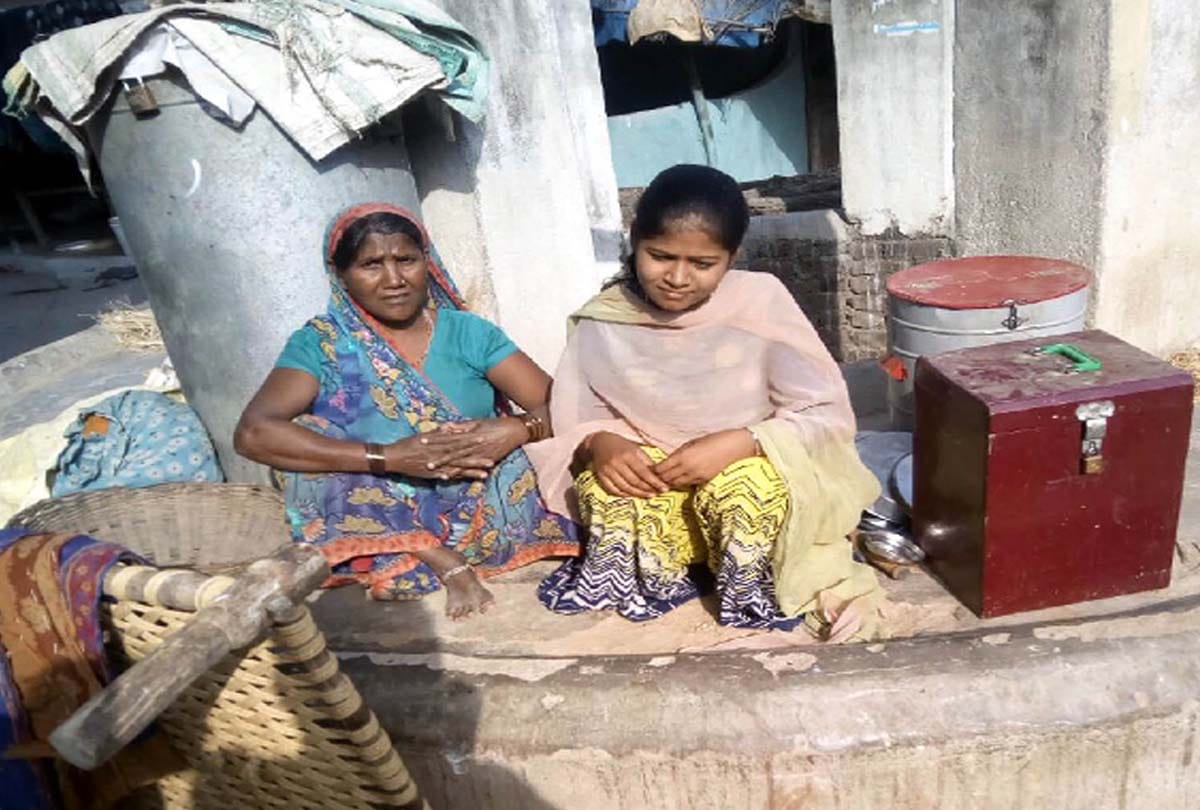 widow with her daughter living near a well