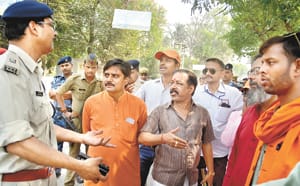 Students encircle house, Proctor resigns