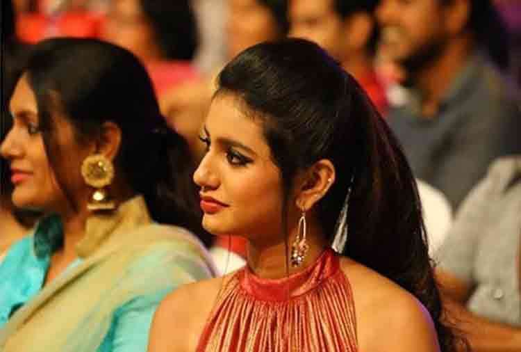 priya prakash varrier new photo viral in social media with a child people ask who is he