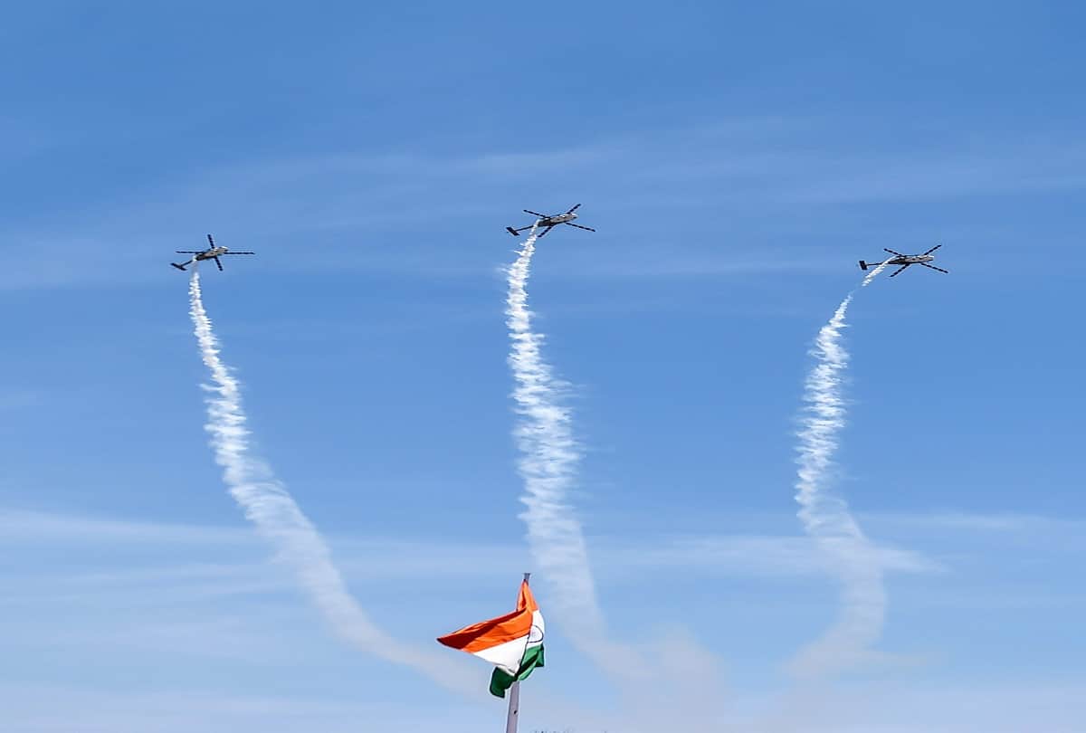 Indian Air Force's 'Sarang' display team performs on the 3rd day of the DefExpo 2018