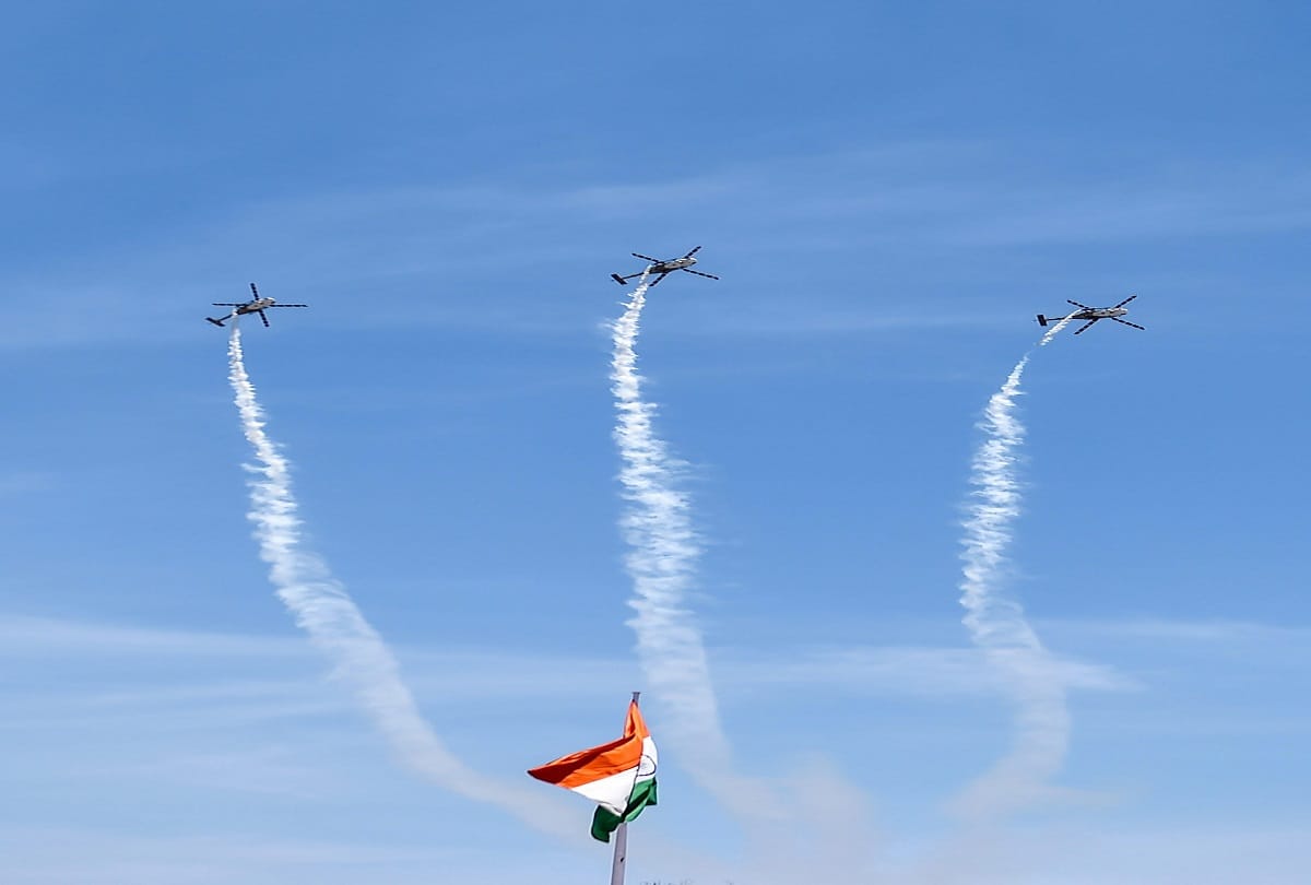 Indian Air Force's 'Sarang' display team performs on the 3rd day of the DefExpo 2018