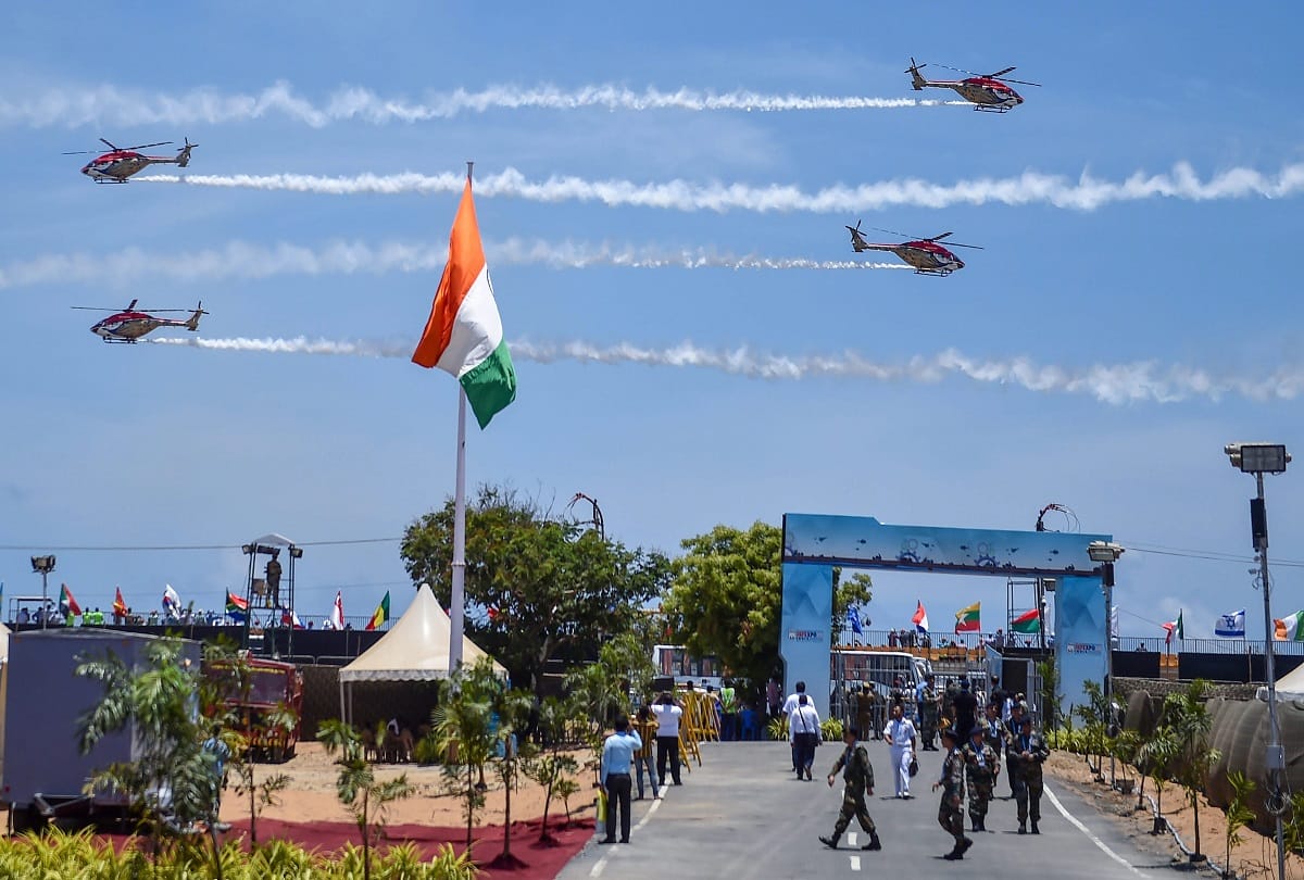 Indian Air Force's 'Sarang' display team performs on the 3rd day of the DefExpo 2018