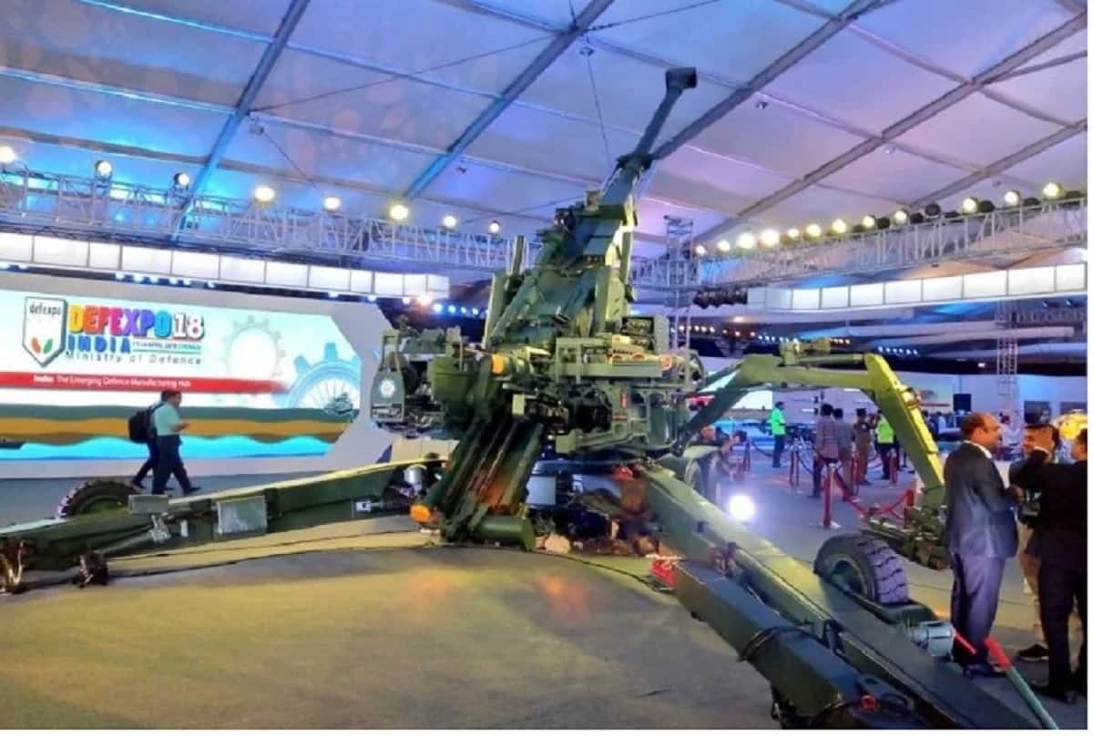 Indian Air Force's 'Sarang' display team performs on the 3rd day of the DefExpo 2018