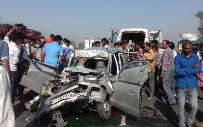 Two killed in car - tractor collision