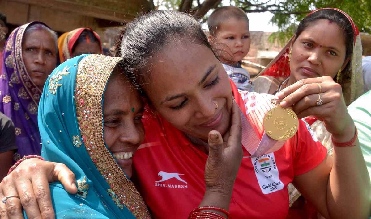 Grand welcome of gold medal winner punam yadav varanasi airport to dandupur village