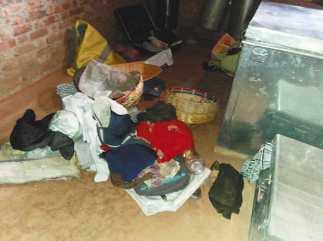 Thieves took cash and stuff from two houses