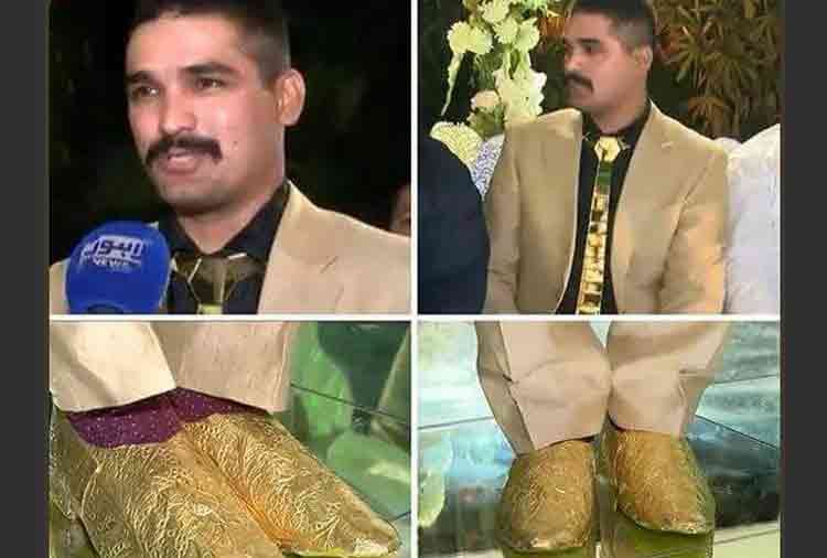 pakistani groom wear golden shoes and golden tie on his marriage reception