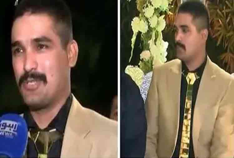 pakistani groom wear golden shoes and golden tie on his marriage reception
