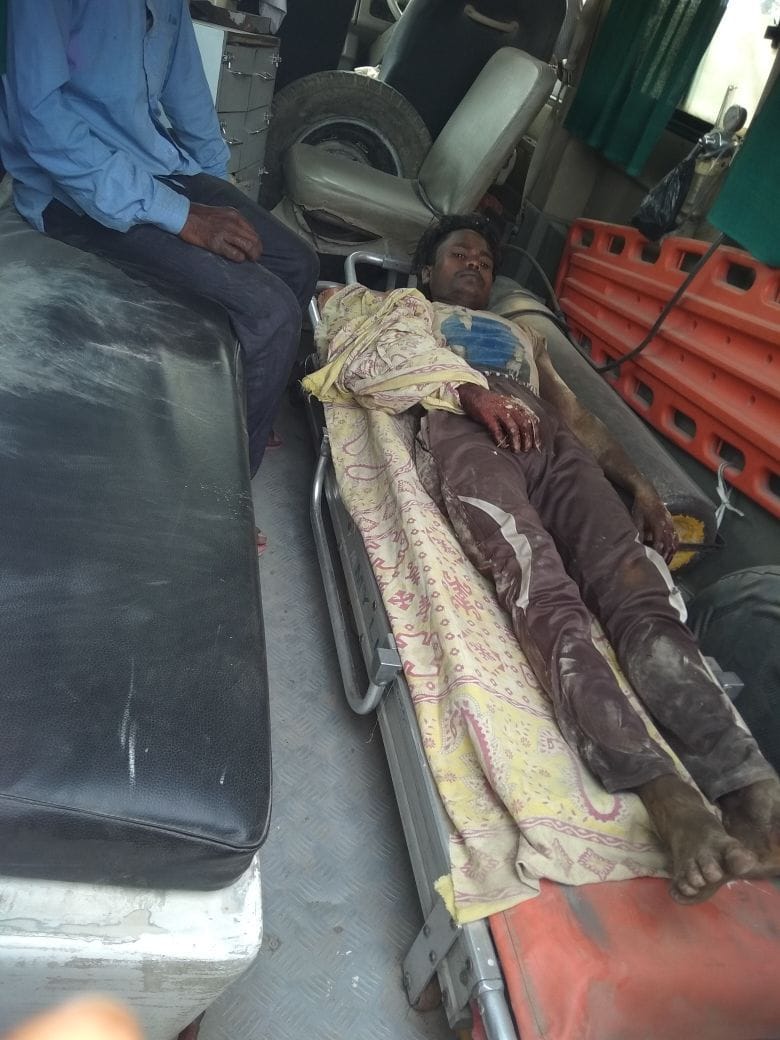 Drunken laborer cut the arm of the young man.