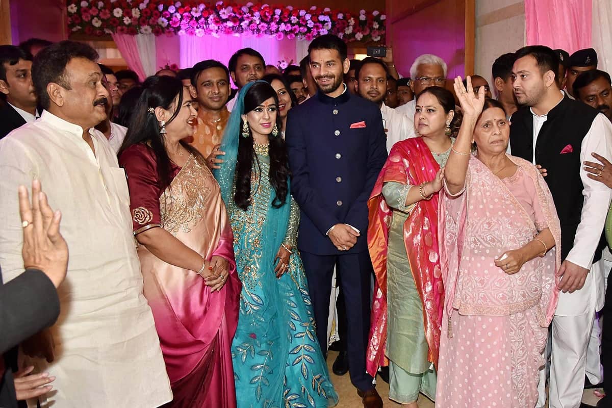 view the pics of tej pratap yadav wedding invitation card delhi-ncr