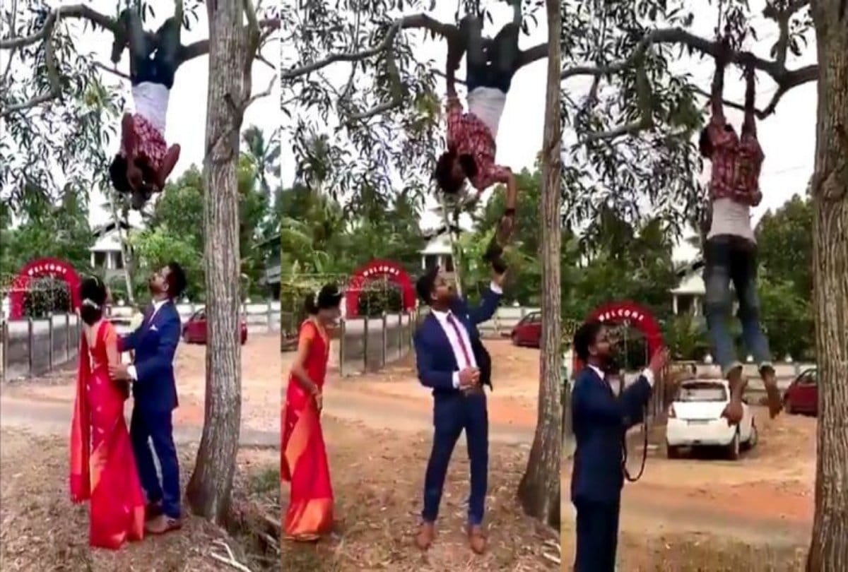 video being viral of this photographer hangs on a tree to get perfect click