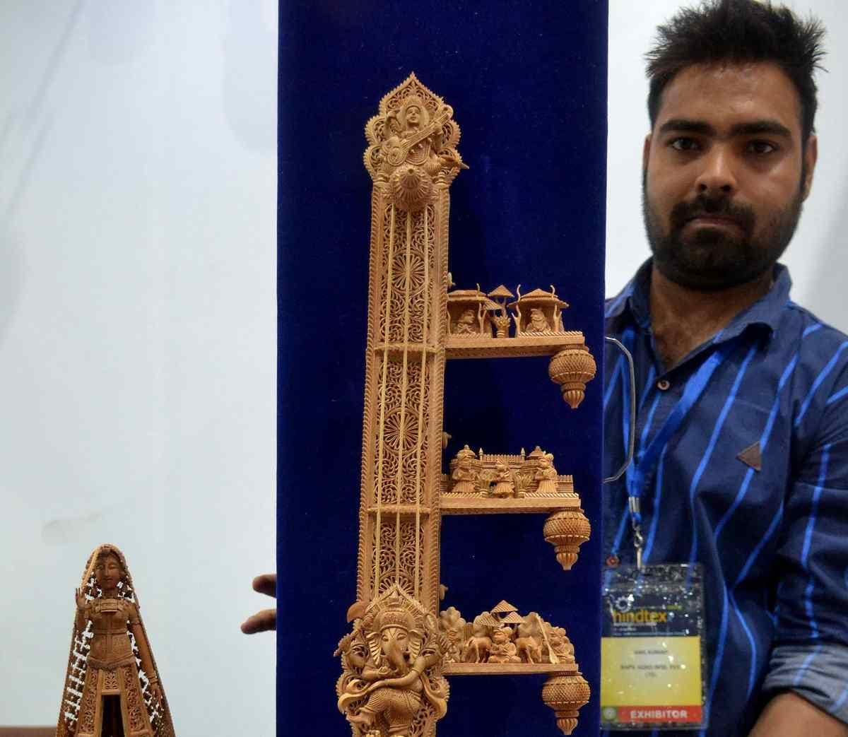 Mahabharata scenes engrave on the sword of sandalwood