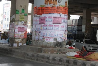 posters on the metro pillar are affected beauty in noida, DMRC rules also useless