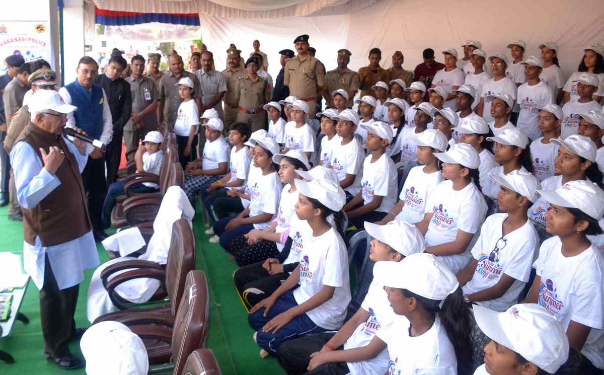 Children take information about AK 47 to rifle and pistol in summer camp