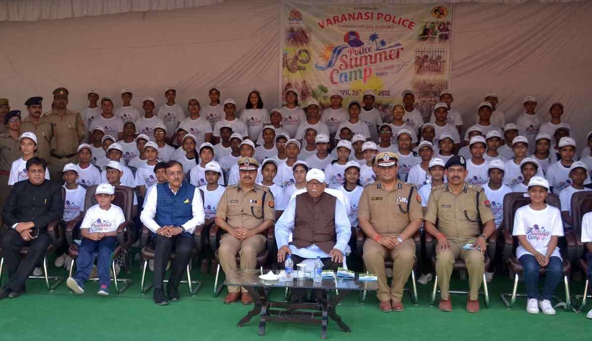 Children take information about AK 47 to rifle and pistol in summer camp