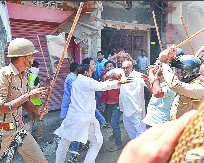 Police beat BJP leader