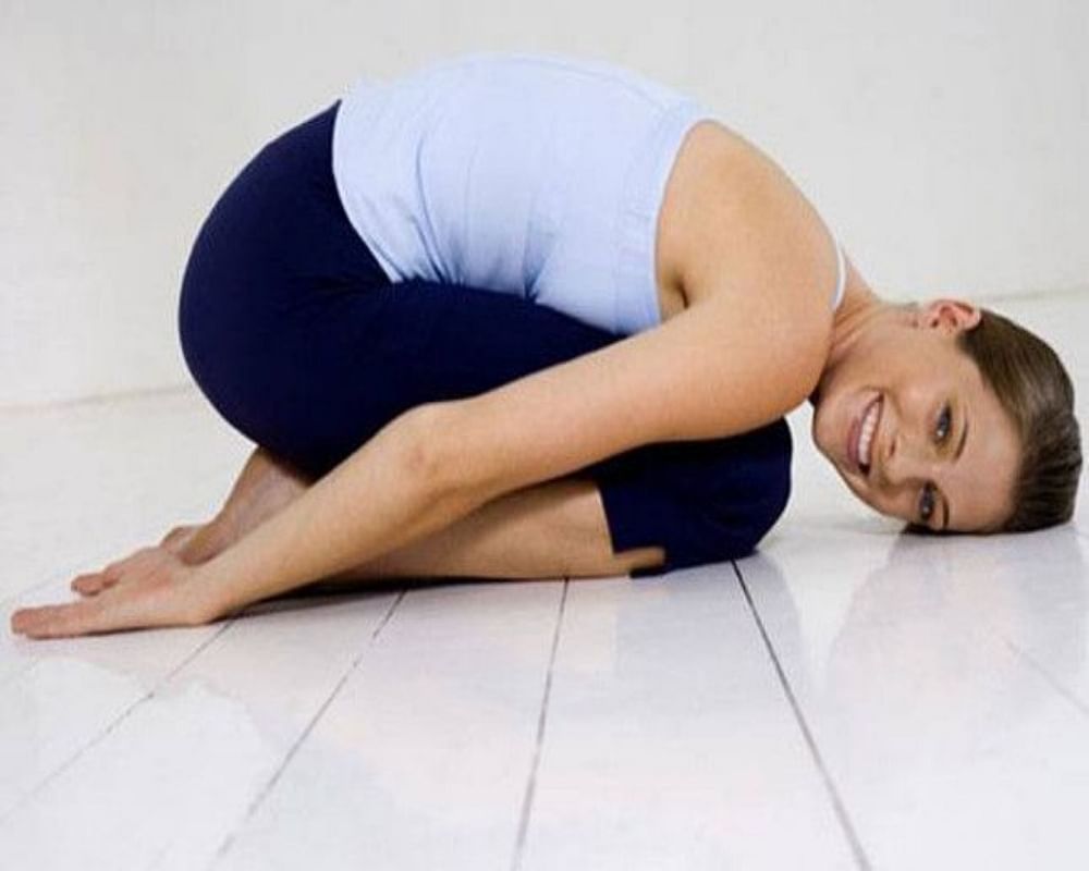 Parsva Balasana: How To Find Inner Peace Through Gentle Yoga Twists | The  Yogatique