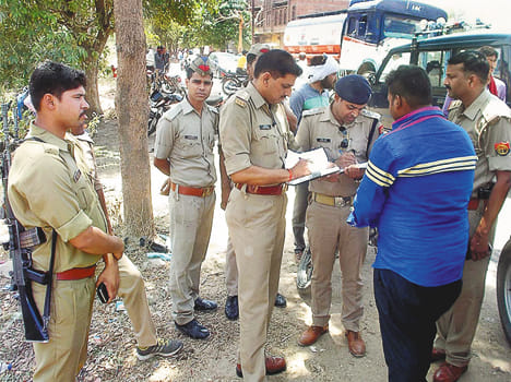 Husband hanged by a trap near the wife's body.