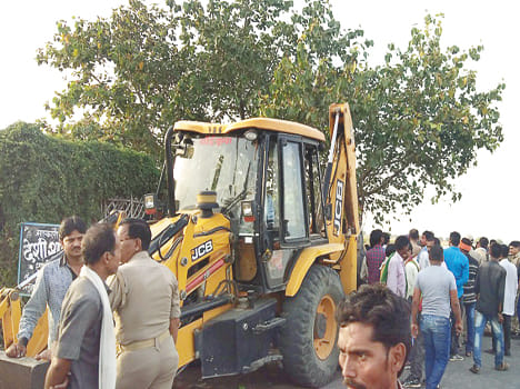 Car in steep JCB, two killed