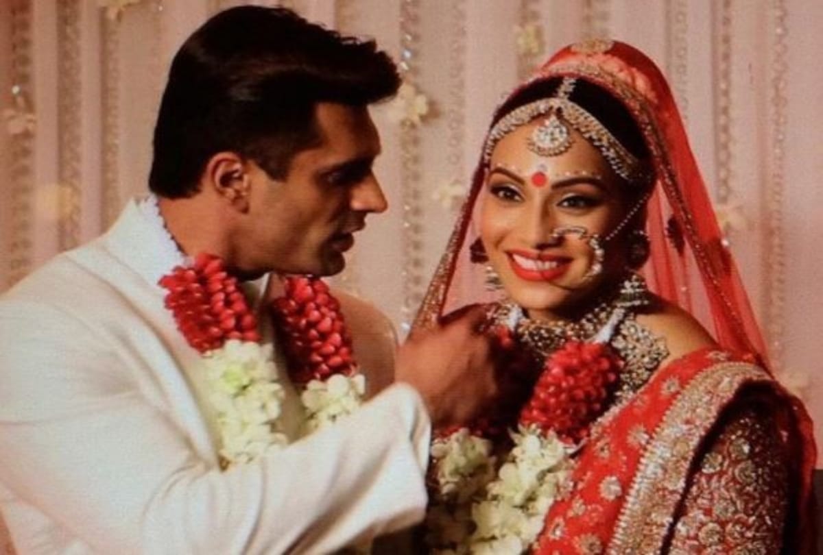 Bipasha Basu Karan Singh Grover celebrating 3rd wedding anniversary with cake and Kisses