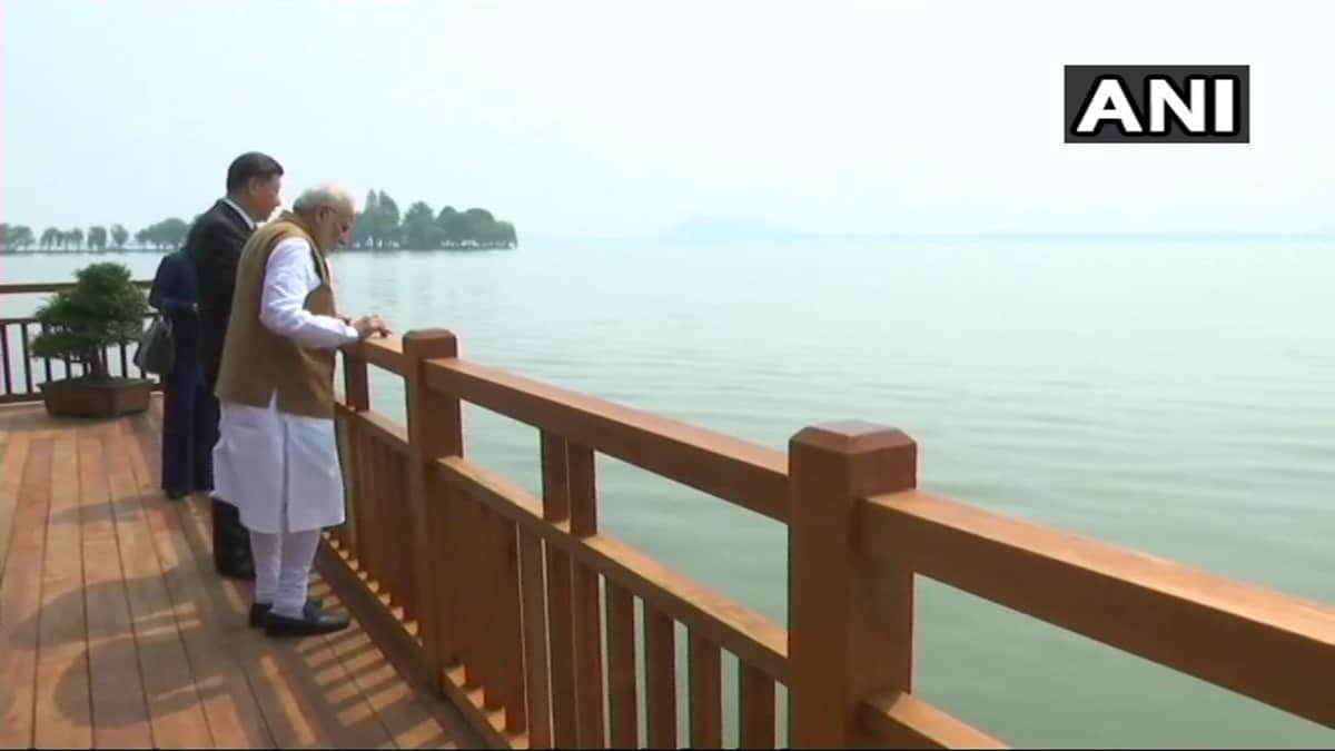 China Visit: Modi and Jinping take a walk along East Lake in Wuhan