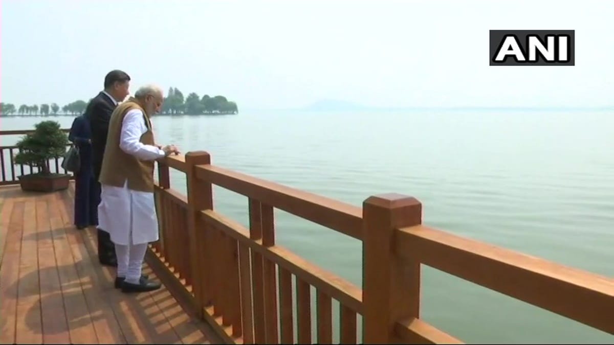 China Visit: Modi and Jinping take a walk along East Lake in Wuhan