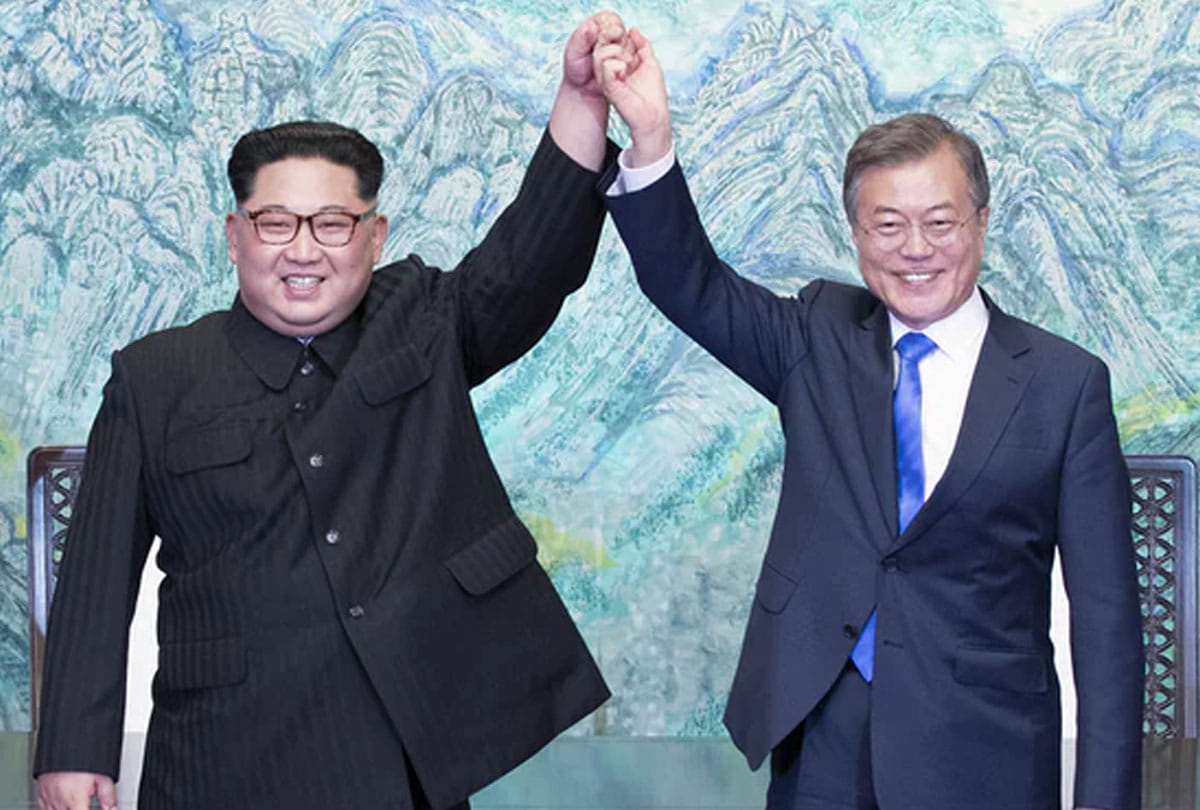 North Korea and South Korea restore stalled communication hotline despite missile tests