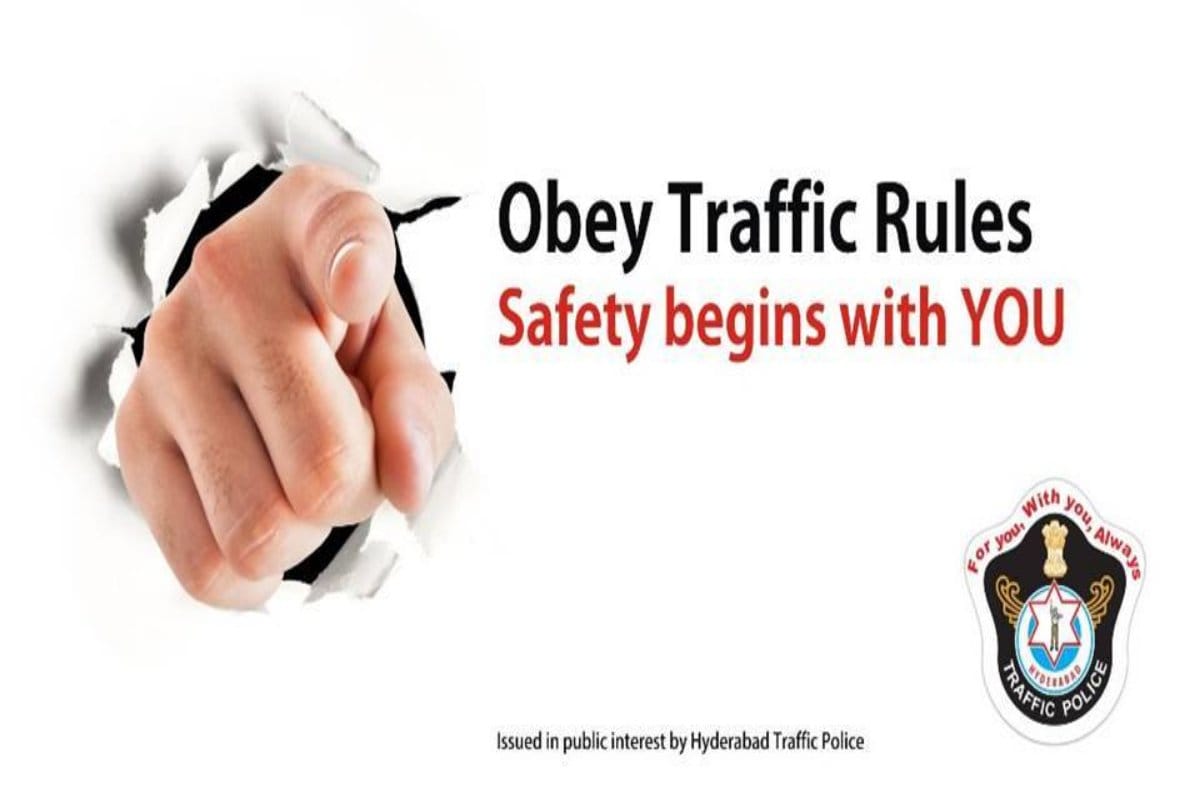 Hyderabad biker Sticker Remark says no helmet i Die like a real man 