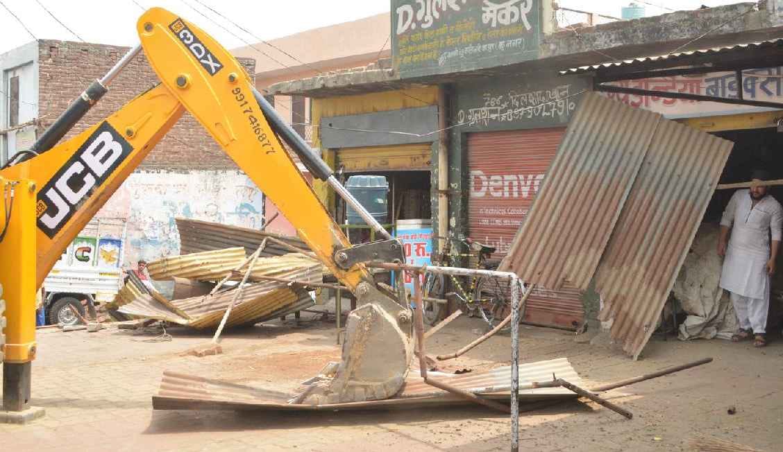 Hammer on illegal encroachment in city