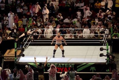 women wrestler was not wear full clothes in WWE match, turbulance in saudi arabia