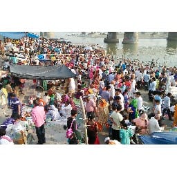 bathinf on the bank of ganga