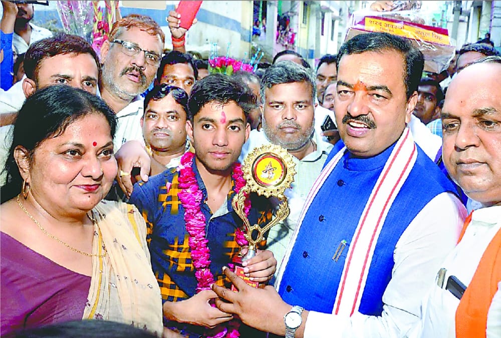 keshav prasad maurya visits intermediate topper's home in barabanki.