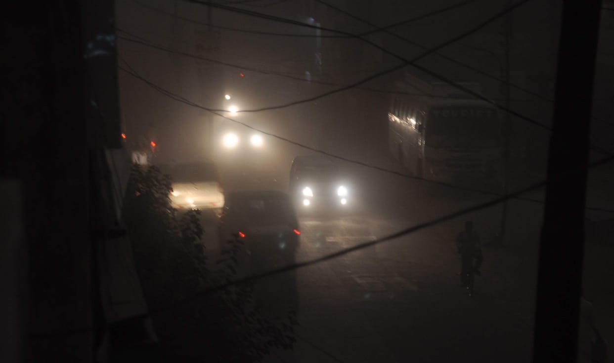 vehicle passes with light due to storm