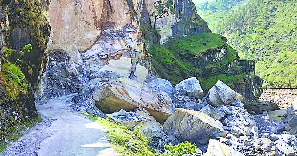 Road blocked for falling of boulder