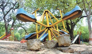 Broken swing, even jogging track