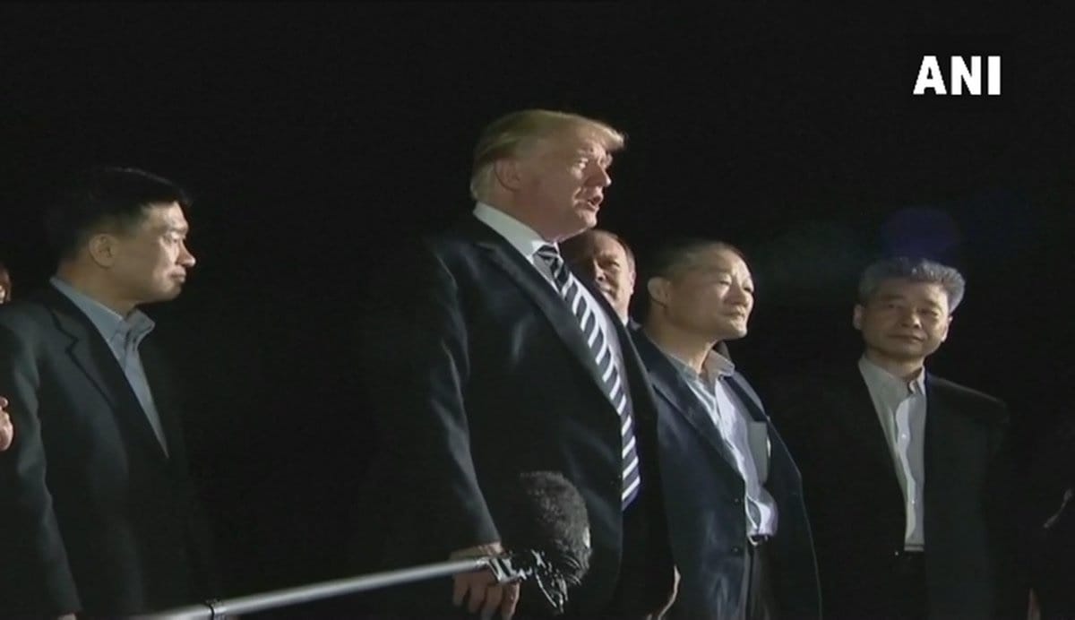 US President Donald Trump receives his 3 citizens freed by North Korea at an airbase