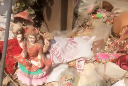Prahlad collects the statues of gods from garbage