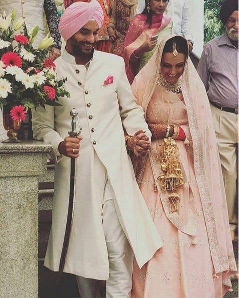 angad bedi married with neha dhupia know about his personal life