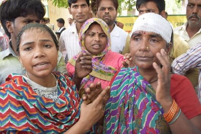 kasganj triple murder's victim woman beat up by police