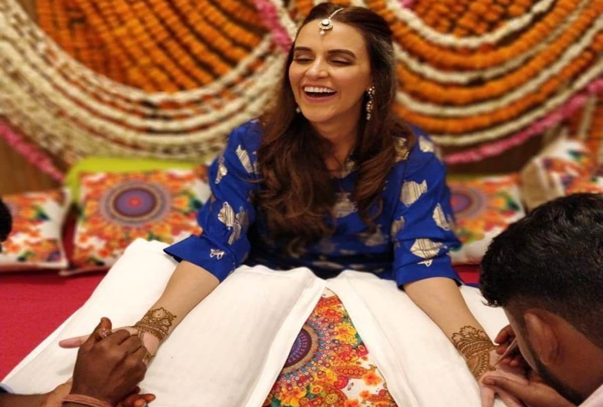 Neha Dhupia and Angad Bedi spotted at Delhi airport before leaving for honeymoon 