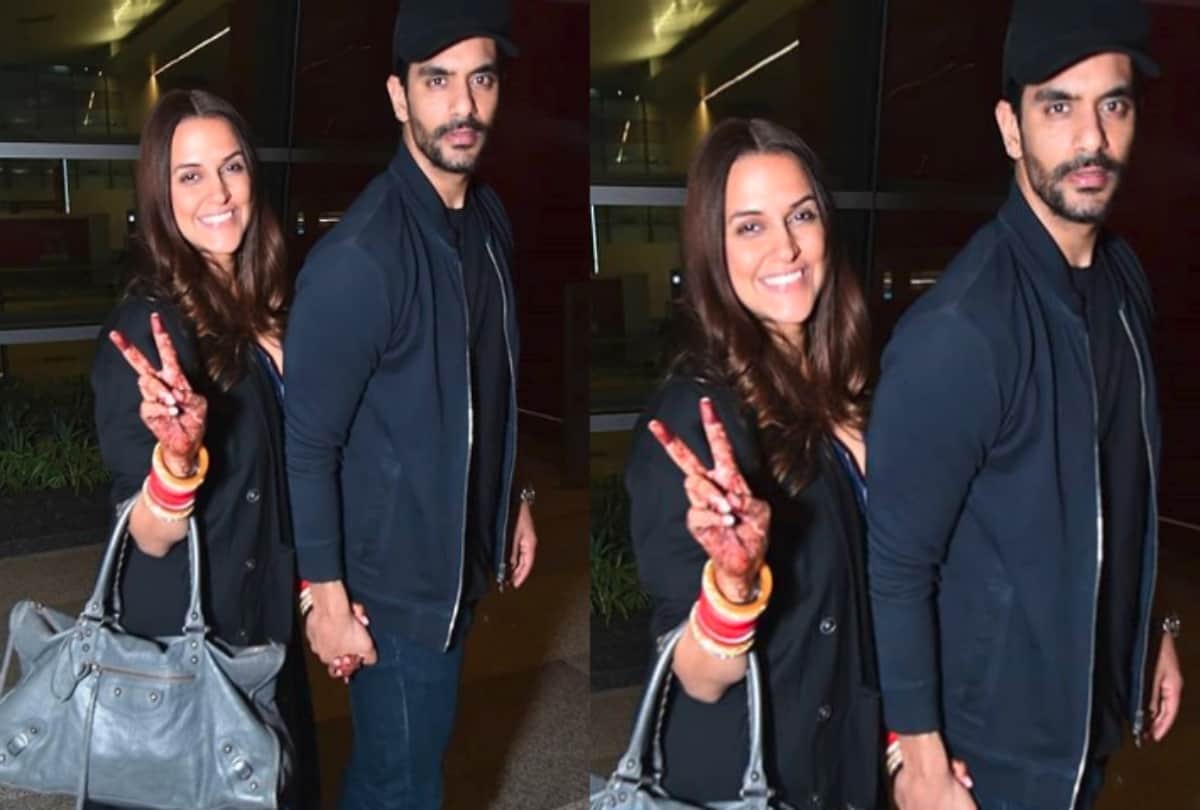 Neha Dhupia and Angad Bedi spotted at Delhi airport before leaving for honeymoon 