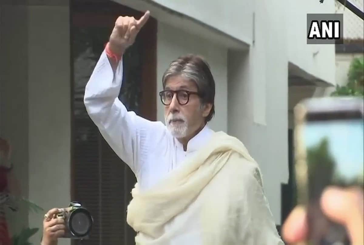 bollywood Actor Amitabh Bachchan greets his fans at his residence in Mumbai