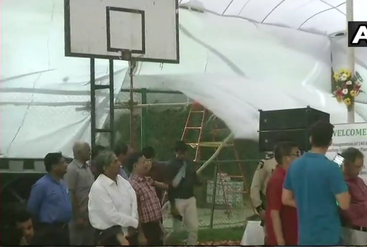 kejriwal reaches ip extension to inaugurate power plant and storm disrupts program
